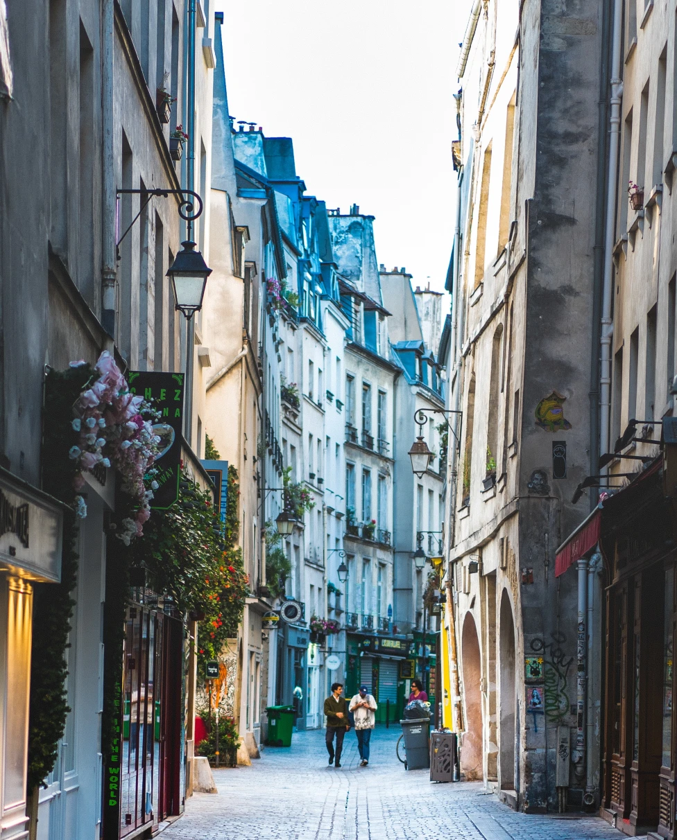 Historic Parisian streets and classic architecture in Le Marais across the 3rd and 4th arrondissements