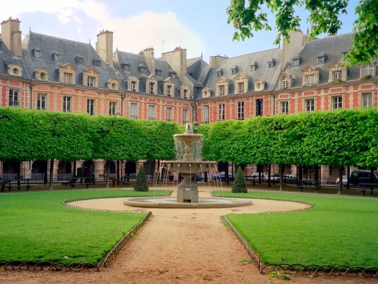 Elegant luxury apartment in Le Marais Paris with historic architectural details and refined interiors